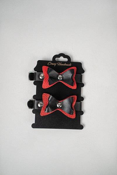 Черно-красные кожаные наручники с бантиками