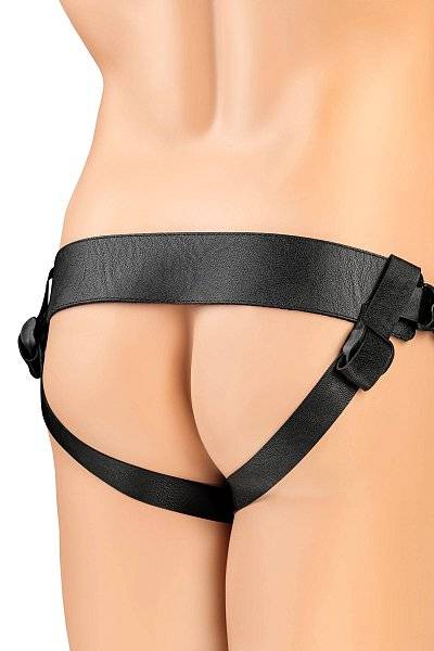 Телесный фаллопротез на черных ремнях Conall - 15 см.