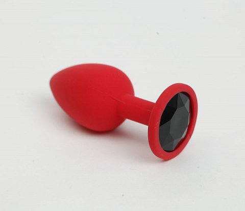 Красная анальная пробка с черным стразом - 7,6 см.