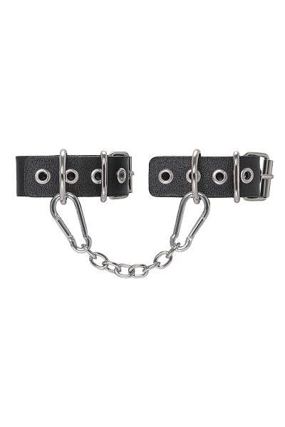 Черные кожаные наручники-браслеты из одного ремешка с люверсами