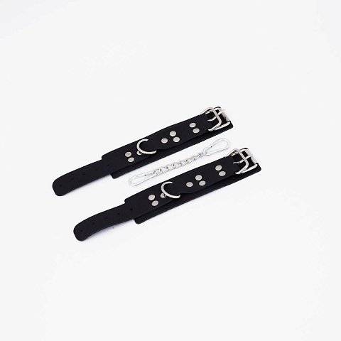 Черные кожаные наручники с регулируемыми ремешками