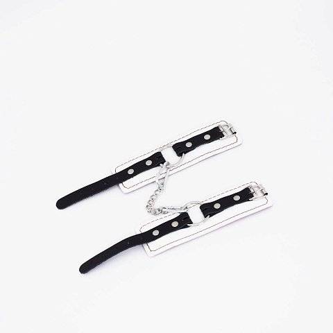 Бело-красные кожаные наручники